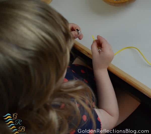 Montessori Homeschool for Toddlers - Stringing Star Beads for Practical Life Skills 