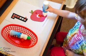 Dot marker tray with apple theme tot school week. www.GoldenReflectionsBlog.com