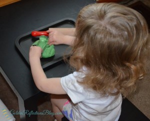 Dog themed play dough tray for montessori inspired tot school week. www.GoldenReflectionsBlog.com