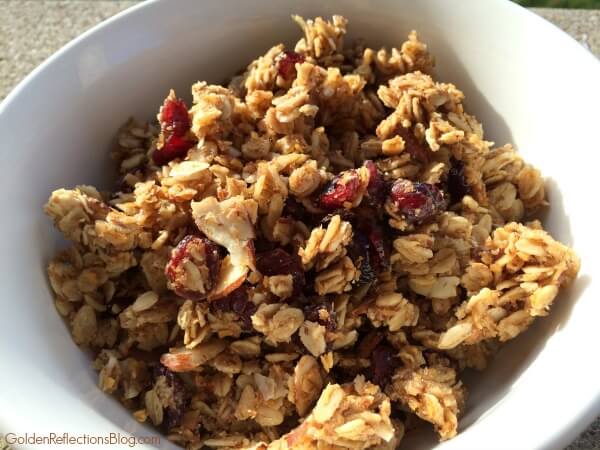 A great way to get the kids in the kitchen helping you with this easy maple granola recipe. www.GoldenReflectionsBlog.com