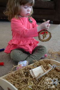 Playing with Nativity Sensory Bin.