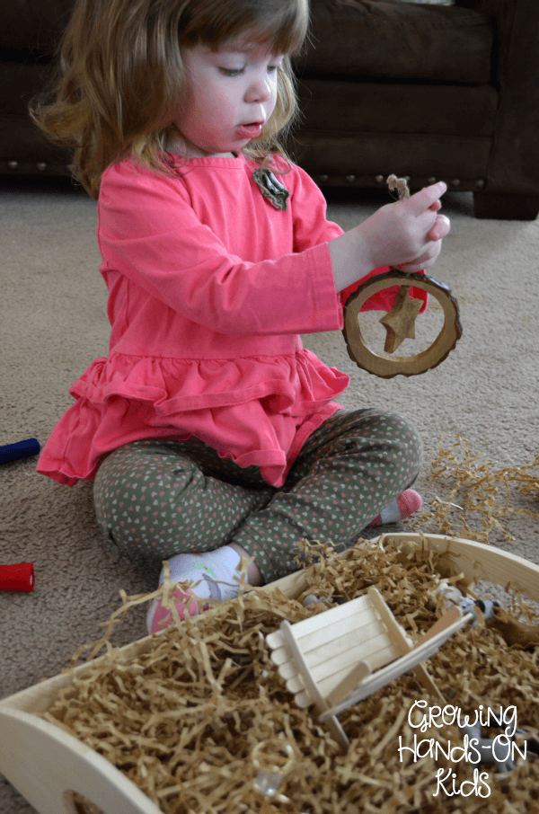 Playing with Nativity Sensory Bin.