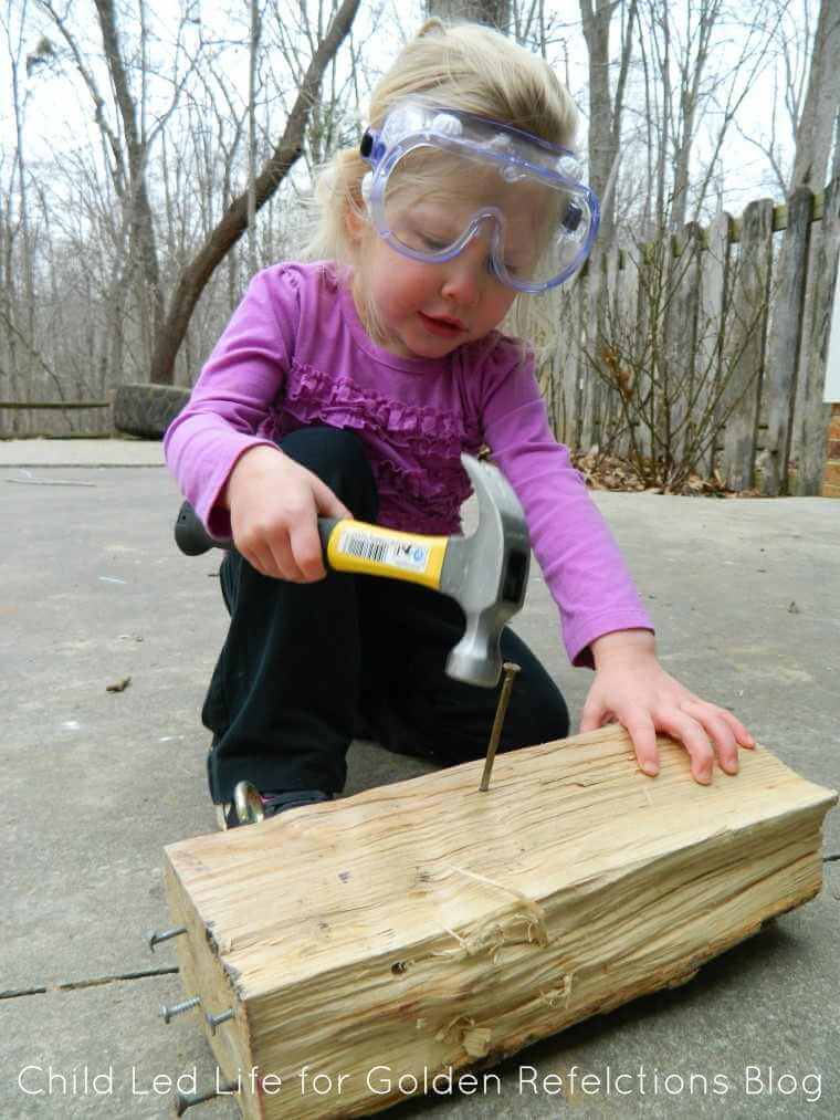 Nail montessori work ideas that double perfectly as proprioception sensory play. www.GoldenReflectionsBlog.com