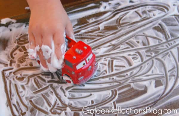 Shaving cream sensory play with cars