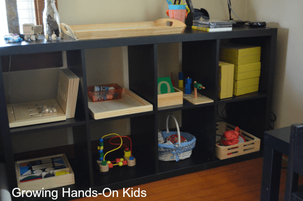 tot-school shelves in Montessori inspired space. 