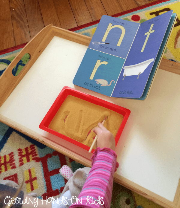 Letter T activities, sand tray writing for pre-writing skills.