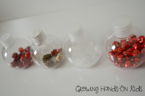 Christmas discovery bottles for baby, perfect for tummy time by the tree.