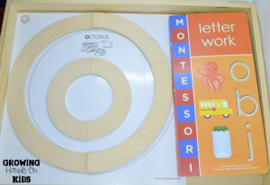 Pre-writing tray for letter O activities with tot-school.