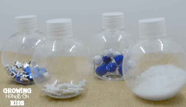 Winter discovery bottles for baby tummy time play.