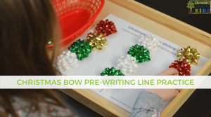 Christmas bow pre-writing line practice for kids. Includes a free printable.