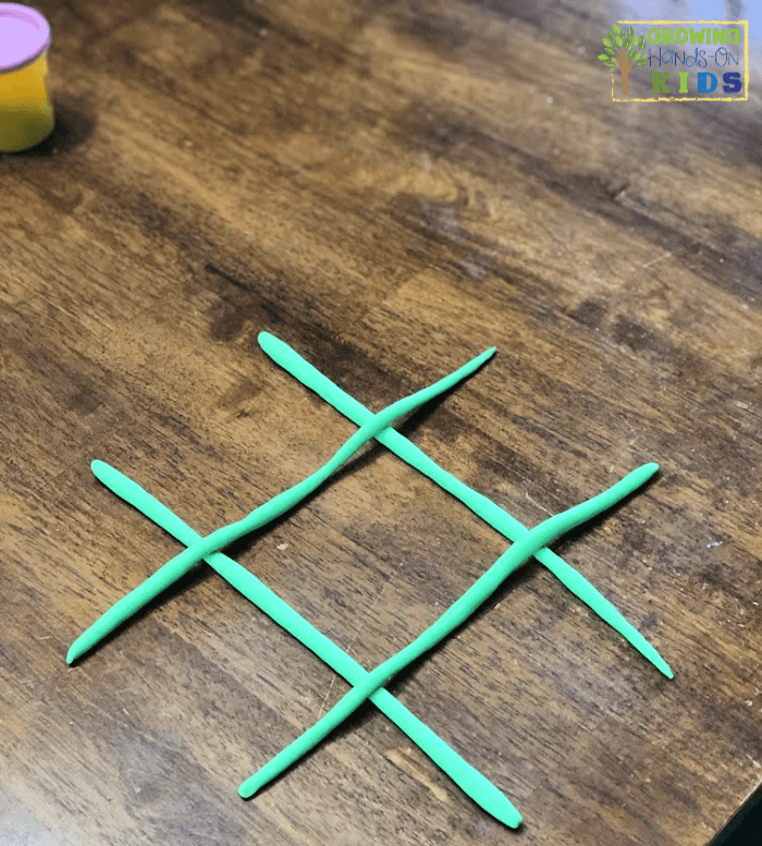 Play dough tic-tac-toe game. Pre-writing activity for kids. 