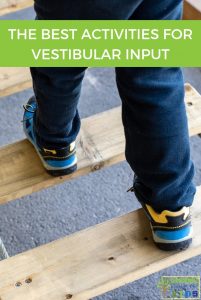 Child in blue pants and sneakers walking on a wood bridge. The words The Best Activities for Vestibular Input are written on the top of the graphic with a green background.