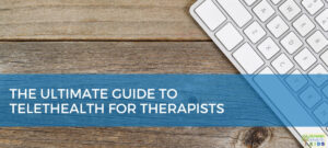 Wood background with a white computer keyboard in the top right corner. Blue overlay with white text that says "The Ultimate Guide to Telehealth for Therapists."